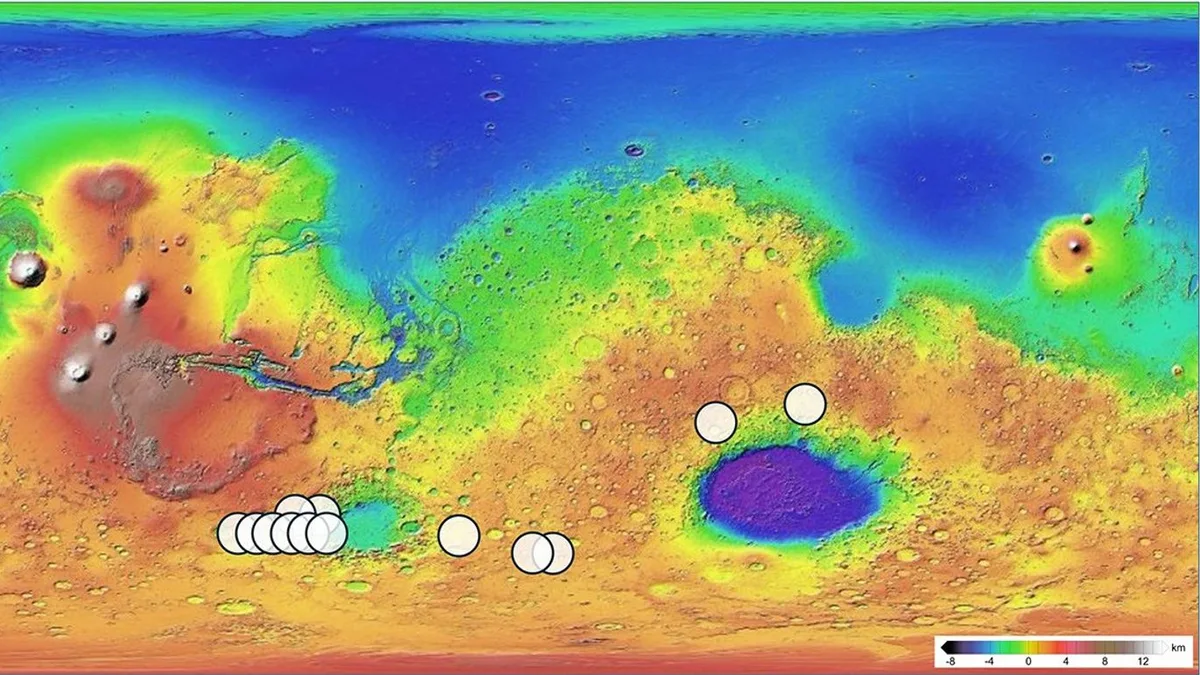 Mars küresel haritasında Teghaza 001 göktaşının olası çıkış noktalarını gösteren beyaz halkalar